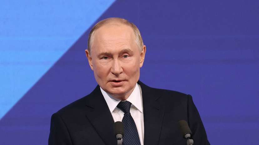 Russian President Putin addresses the audience before a concert in Moscow