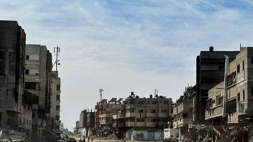 Residents inspect damages caused to Zeitoun neighborhood, in Gaza City