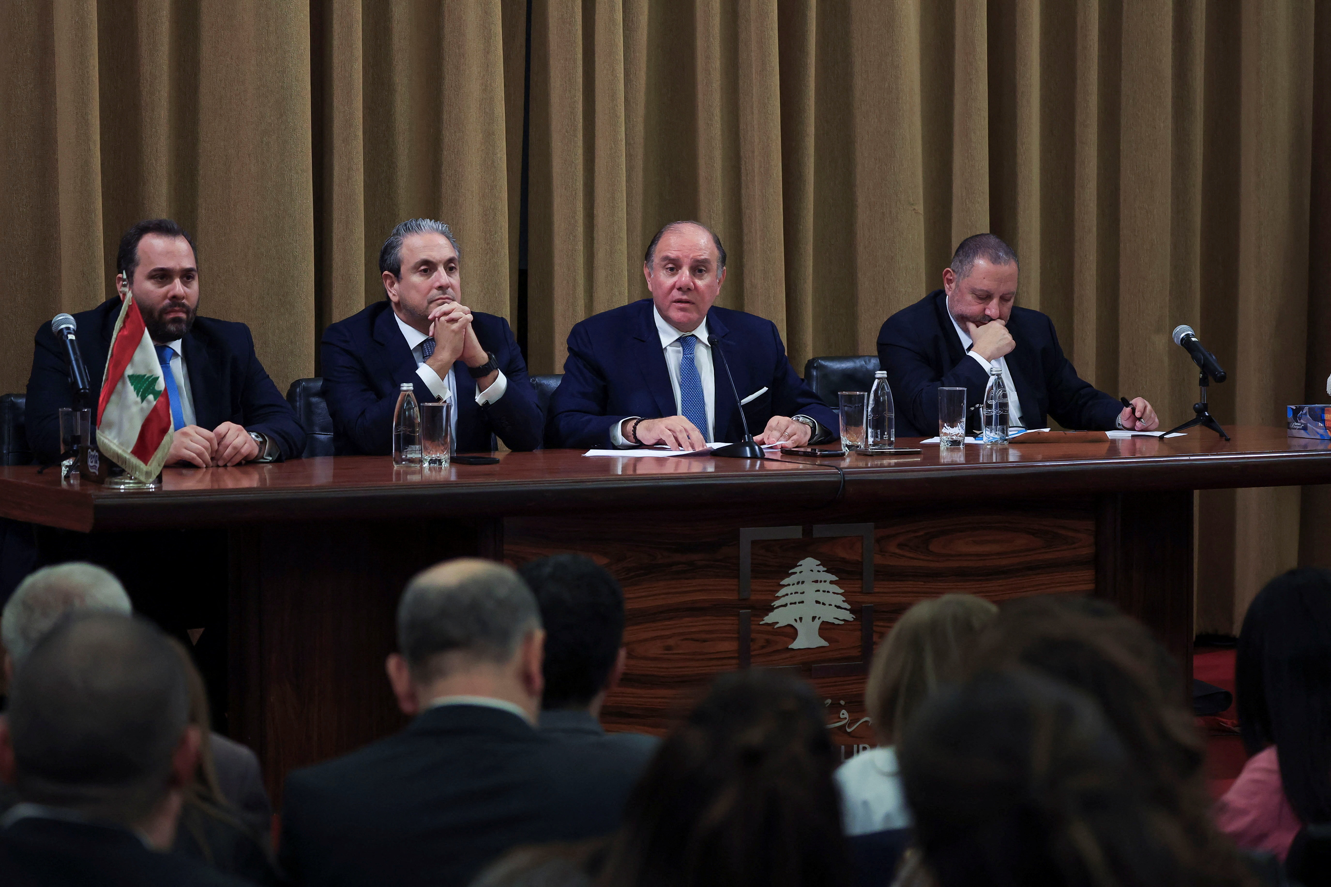 Central Bank of Lebanon Governor Karim Souaid and other central banks officials attend a press conference in Beirut