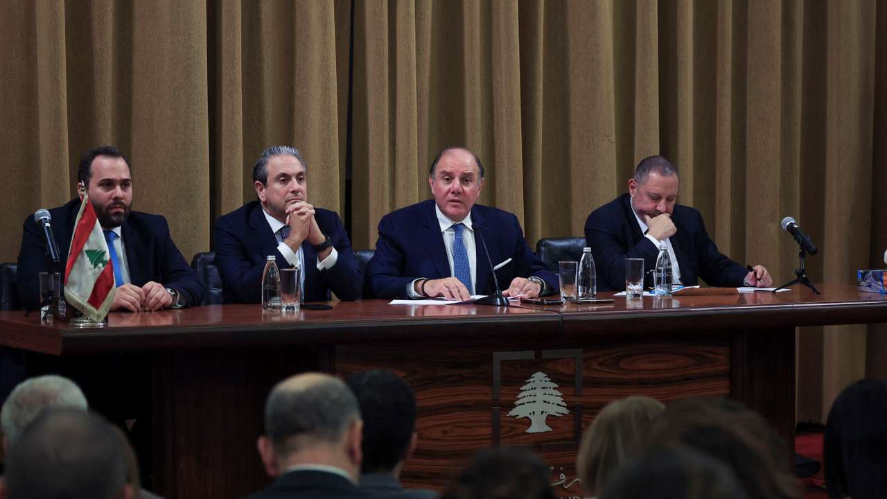 Central Bank of Lebanon Governor Karim Souaid and other central banks officials attend a press conference in Beirut