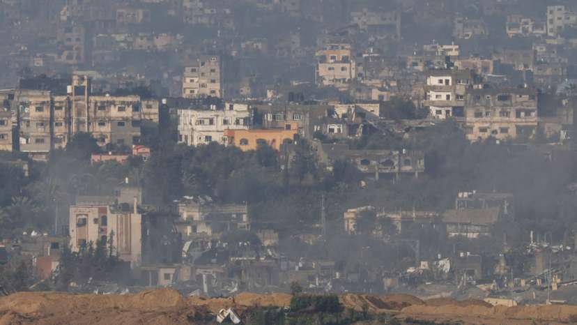 A view shows damaged buildings in Gaza, amid the ongoing conflict between Israel and the Palestinian Islamist group Hamas, as seen from Israel