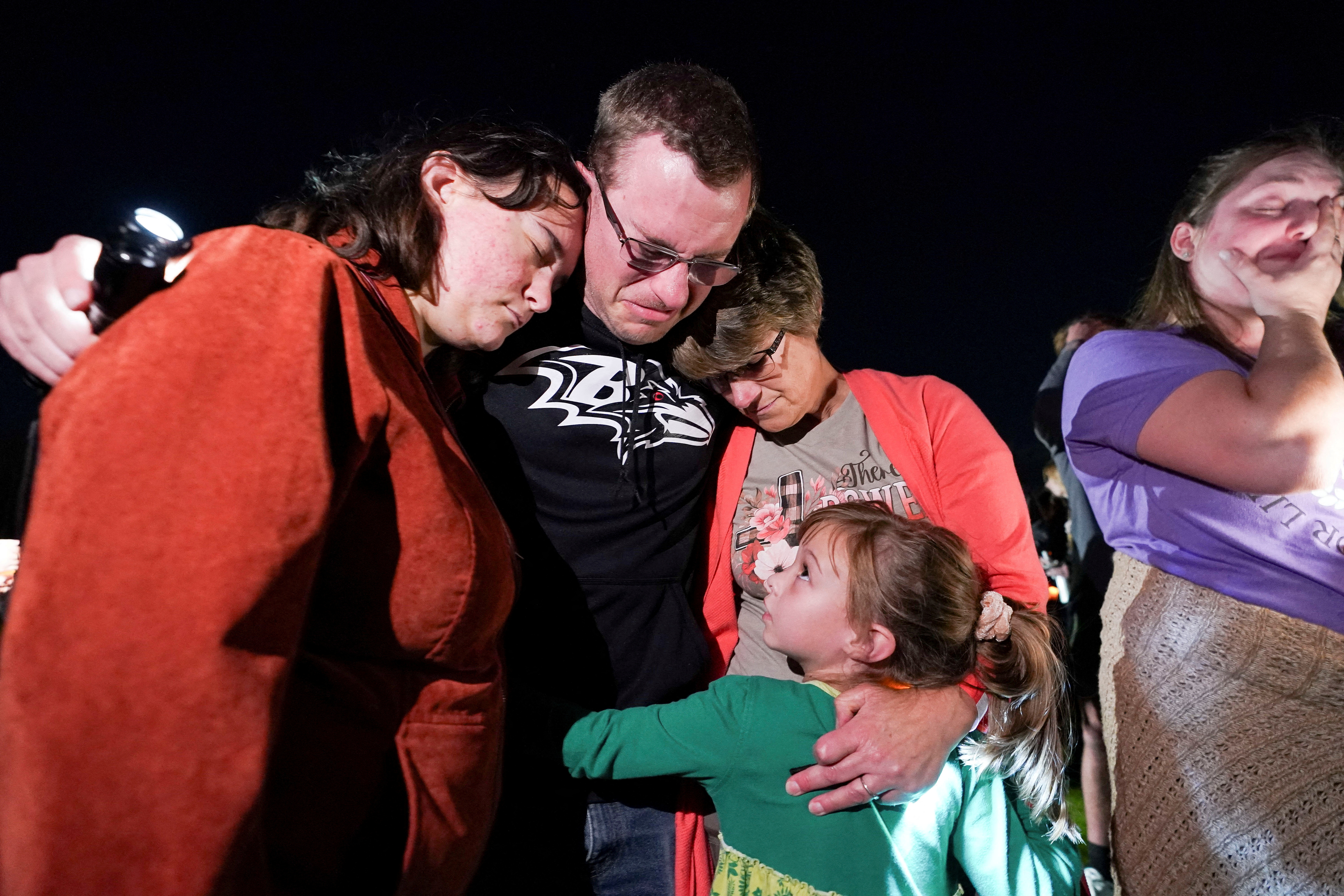 Candlelight vigil for victims of Lewiston mass shooting, in Lisbon