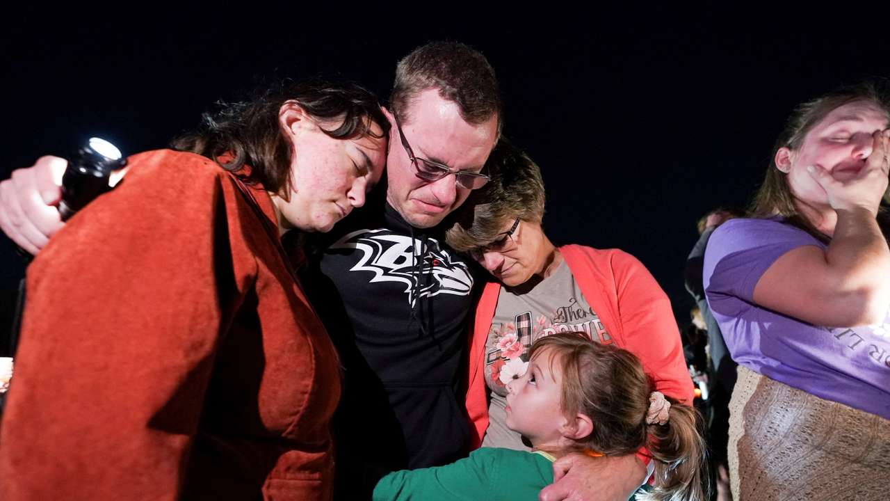 Candlelight vigil for victims of Lewiston mass shooting, in Lisbon