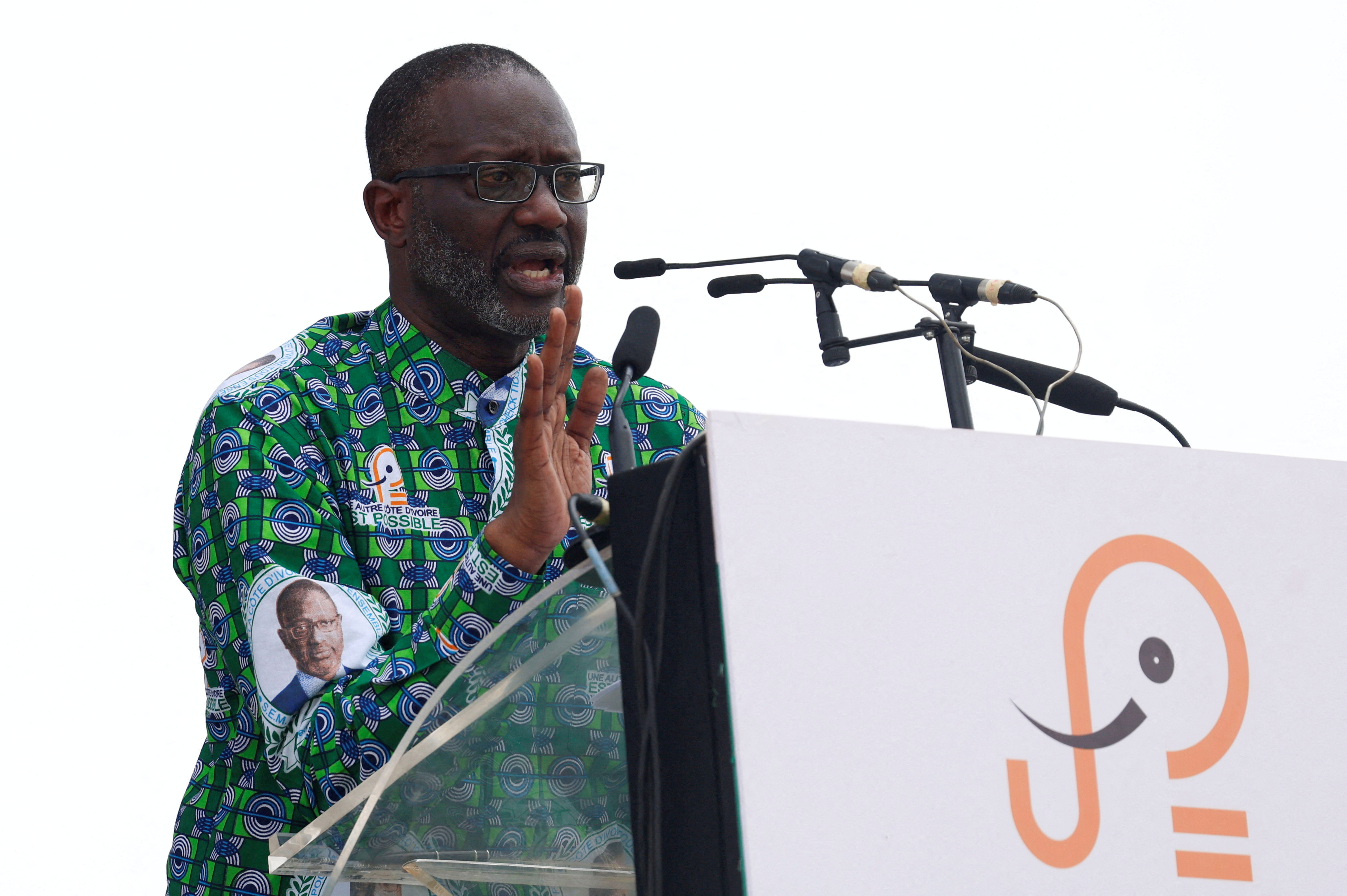 FILE PHOTO: Tidjane Thiam, president of the PDCI (Democratic Party of Cote d'Ivoire), speaks during a meeting in Abidjan