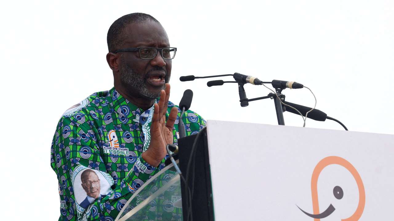 FILE PHOTO: Tidjane Thiam, president of the PDCI (Democratic Party of Cote d'Ivoire), speaks during a meeting in Abidjan