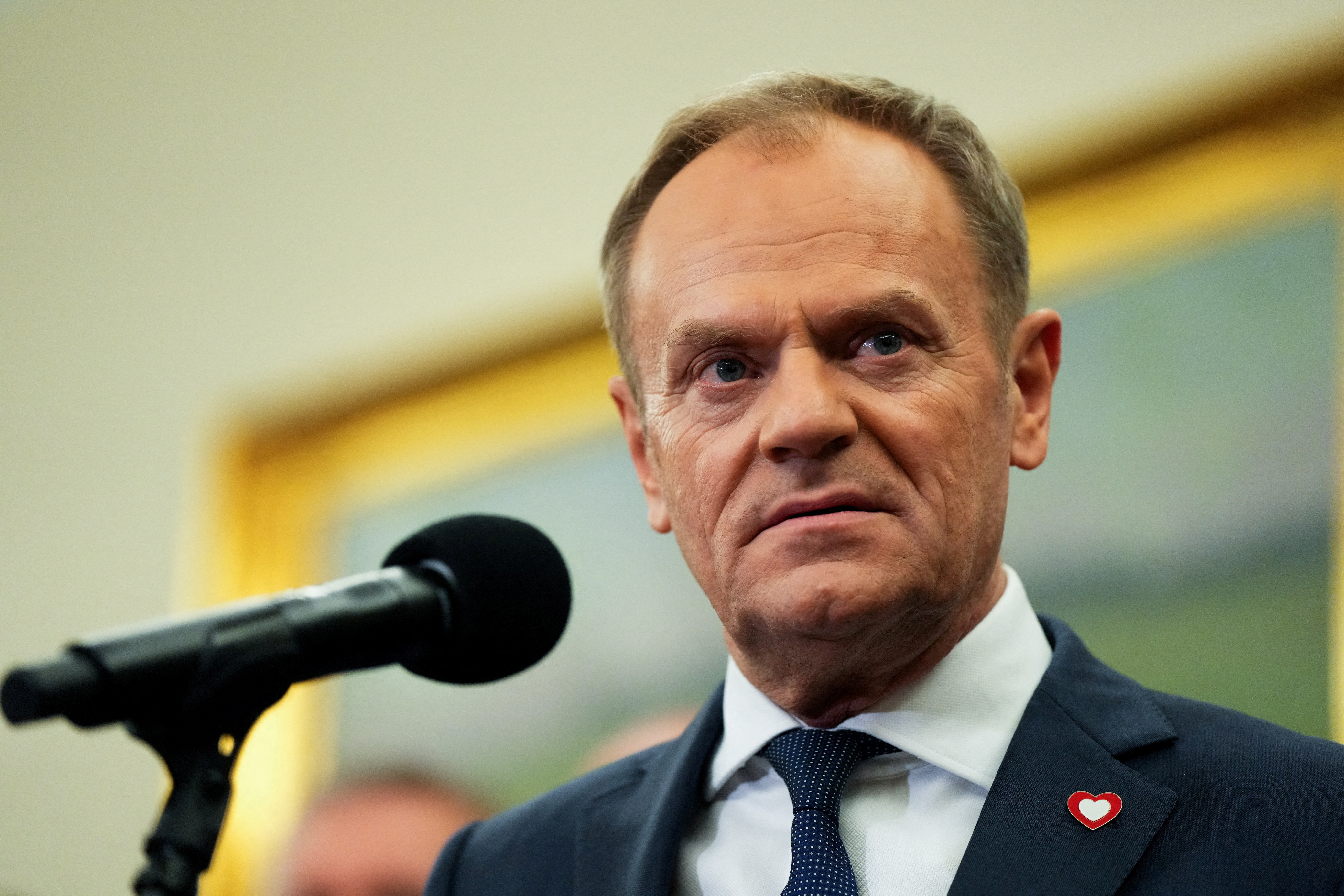 FILE PHOTO: Newly appointed Polish PM Tusk wins the vote of confidence for his government, in Parliament, in Warsaw