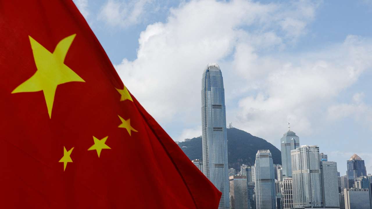 The Chinese national flag is seen in front of the financial district Central on the Chinese National Day in Hong Kong