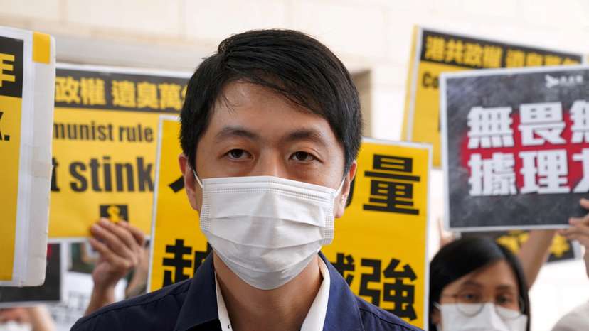 FILE PHOTO: Former pro-democracy lawmaker Ted Hui Chi-fung appears outside West Kowloon Magistrates' Courts in Hong Kong