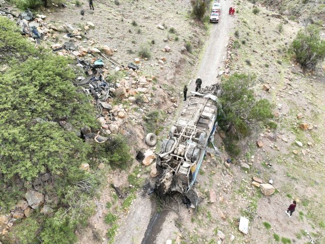 Emergency personnel respond to the scene of a deadly bus crash, in Yocalla