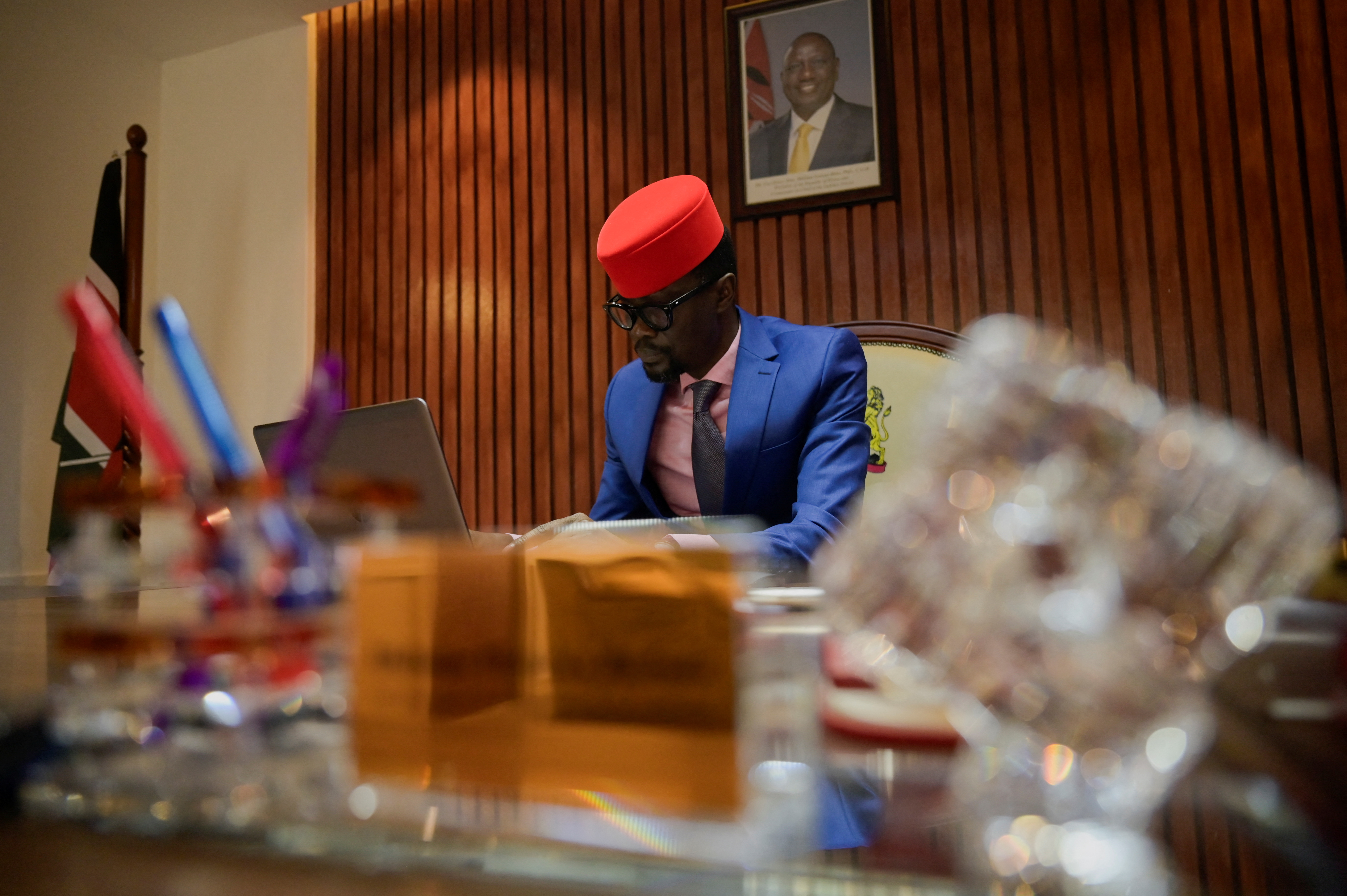 Didmus Barasa, a Kenyan Member of Parliament works in his office in Nairobi