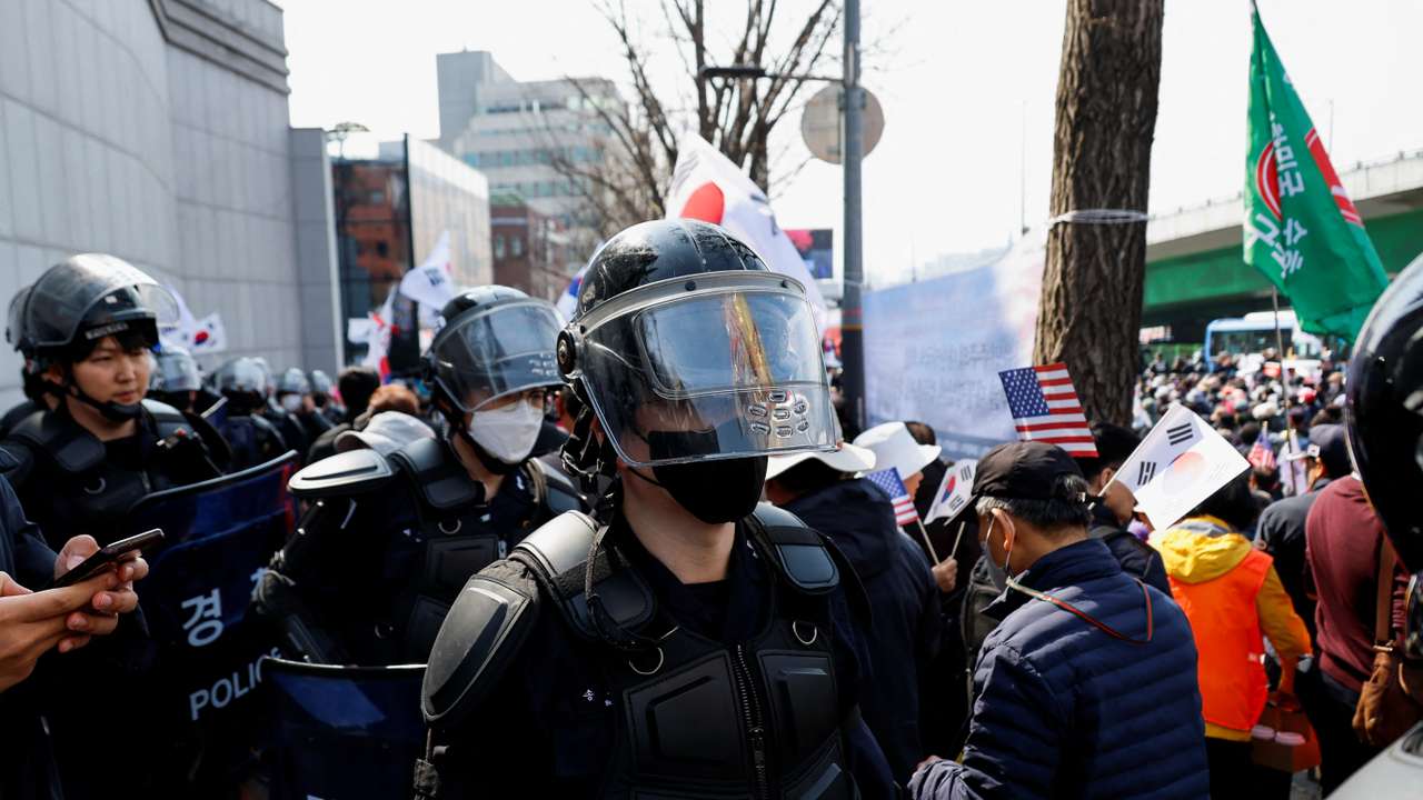 Far-right demonstrators gather as they wait for the Constitutional Court ruling on President Yoon Suk Yeol's impeachment, near his residence in Seoul