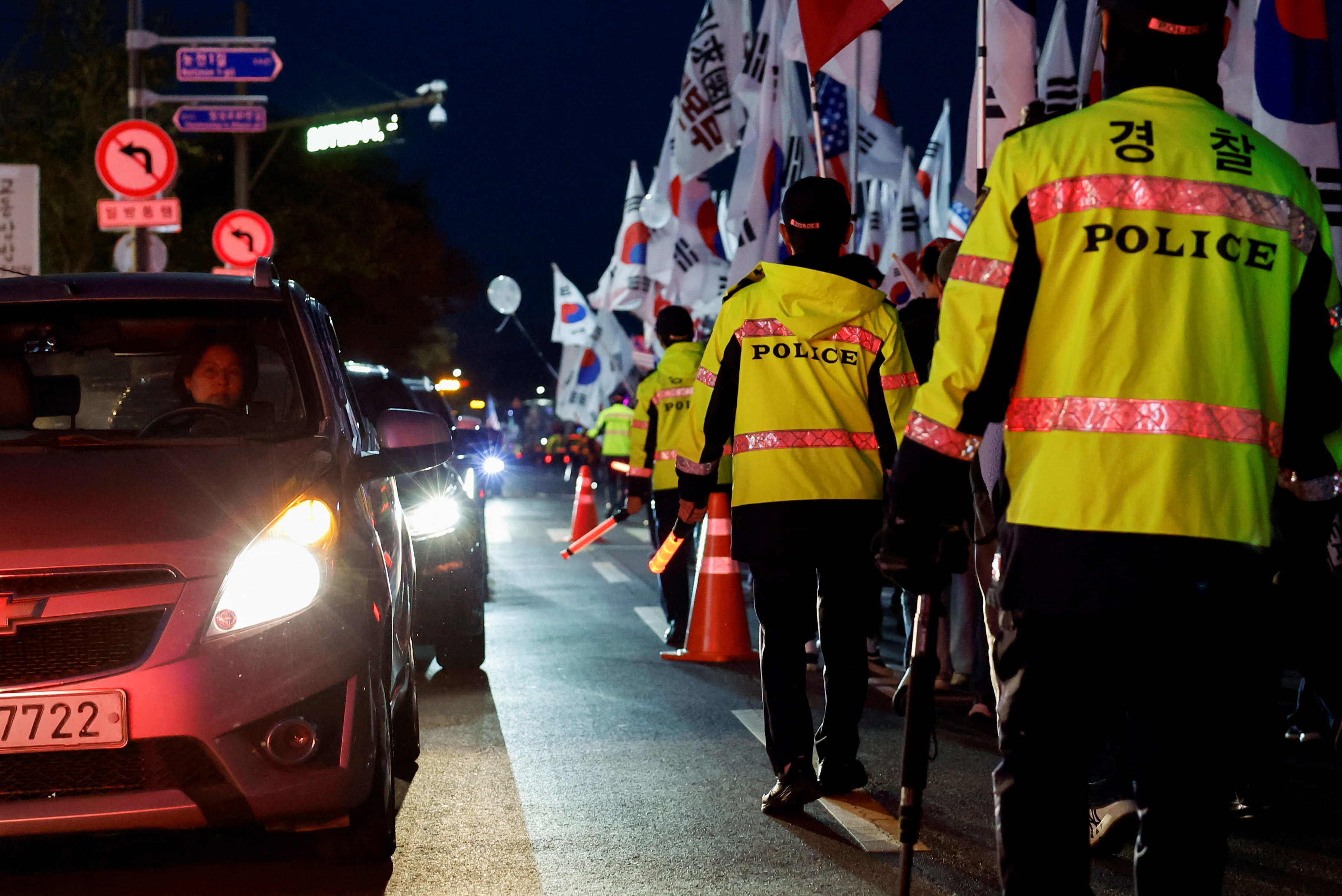 Far-right protesters take part in an anti-China rally on the day of the 2025 Asia-Pacific Economic Cooperation leaders' summit in Gyeongju