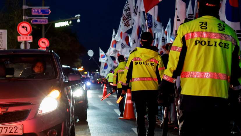 Far-right protesters take part in an anti-China rally on the day of the 2025 Asia-Pacific Economic Cooperation leaders' summit in Gyeongju