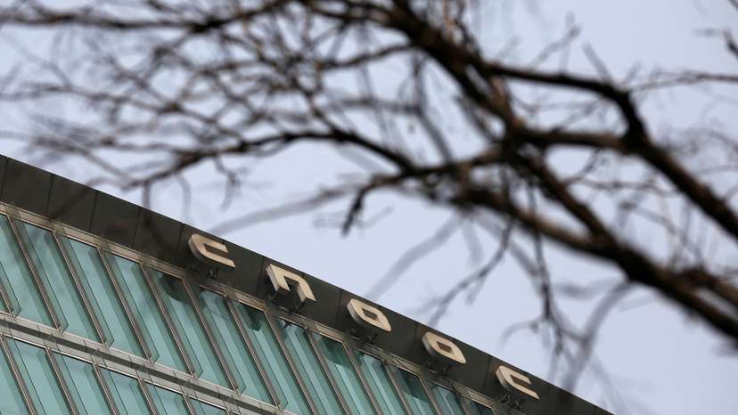 FILE PHOTO: China National Offshore Oil Corp (CNOOC) headquarters in Beijing