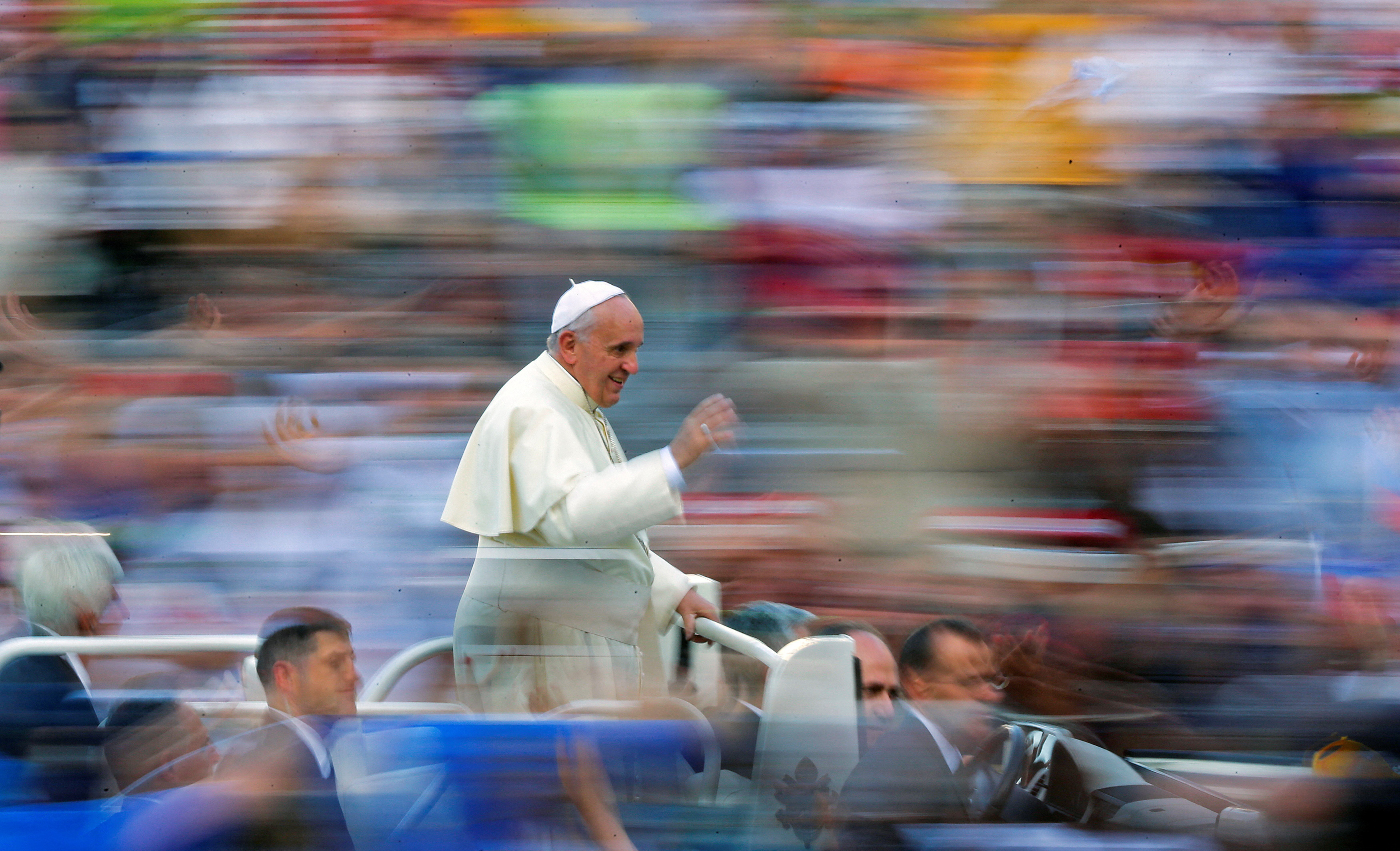 FILE PHOTO: Pope Francis waves as he leads a special audience in Saint Peter's Square at the Vatican