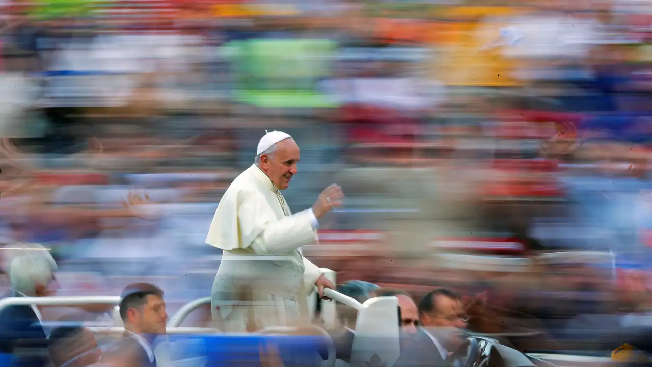 FILE PHOTO: Pope Francis waves as he leads a special audience in Saint Peter's Square at the Vatican