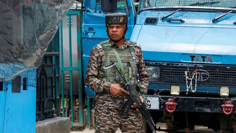 An Indian security force personnel stands guard on a street, following the Pahalgam attack in south Kashmir, in Srinagar
