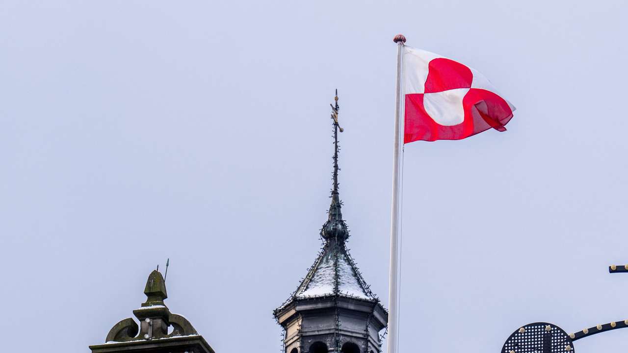 The Greenlandic flag, Erfalasorput, waves at the H.C. Andersen Castle, also known as the Tivoli Castle, in Copenhagen