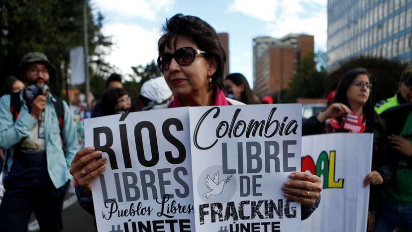 FILE PHOTO: Environmental activists gather to urge world leaders to take action against climate change in Bogota