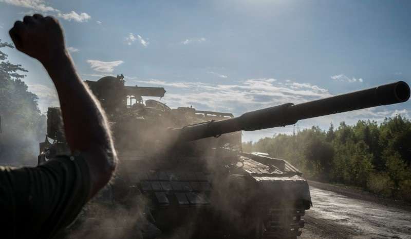 Ukrainian serviceman operates a tank near the Russian border in Sumy region