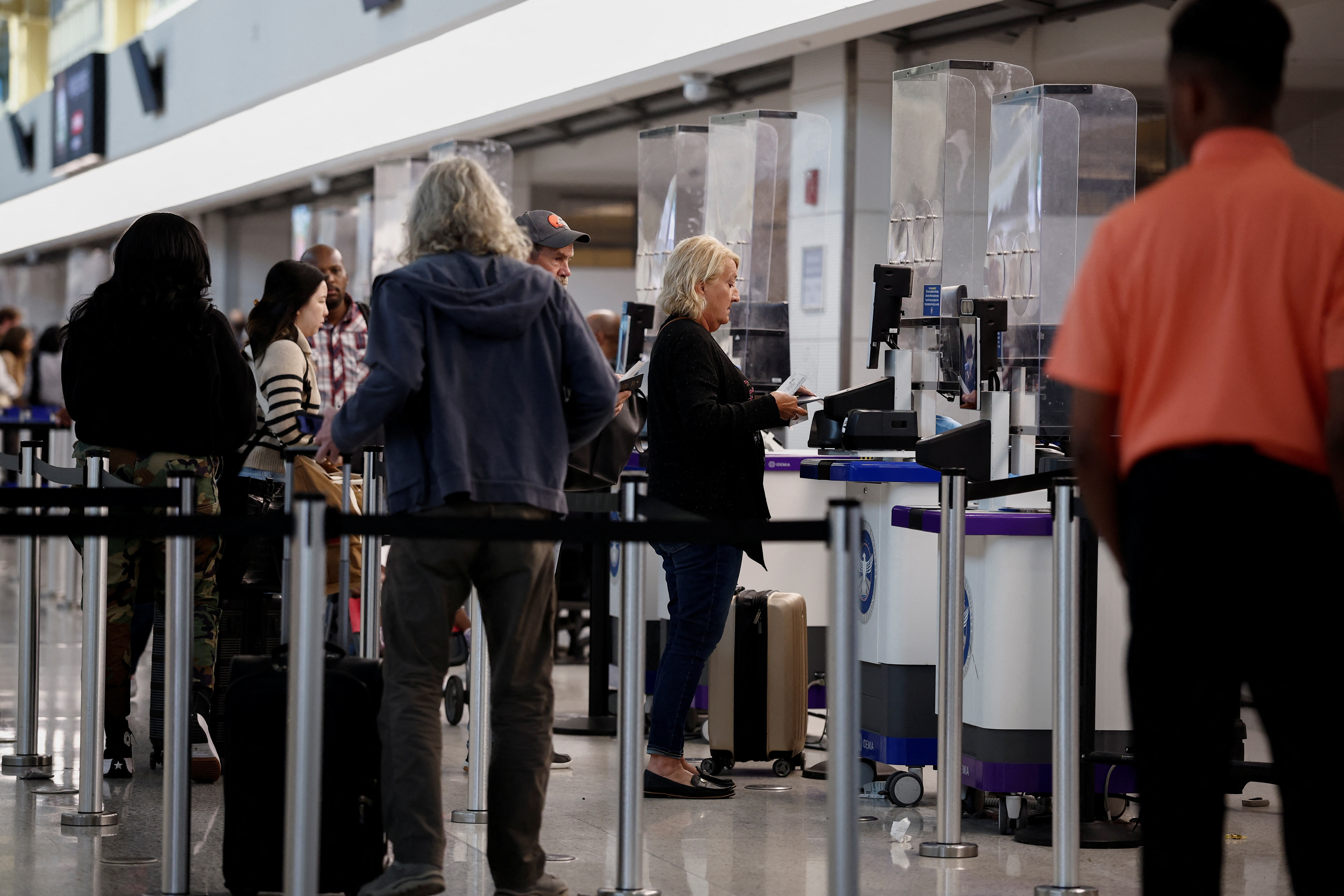Travelers at Ronald Reagan National Airport (DCA) ahead of the Thanksgiving holiday in Arlington