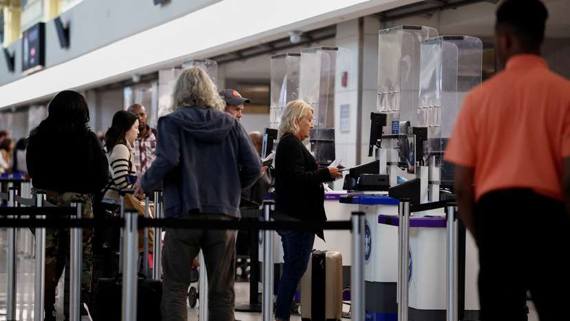 Travelers at Ronald Reagan National Airport (DCA) ahead of the Thanksgiving holiday in Arlington