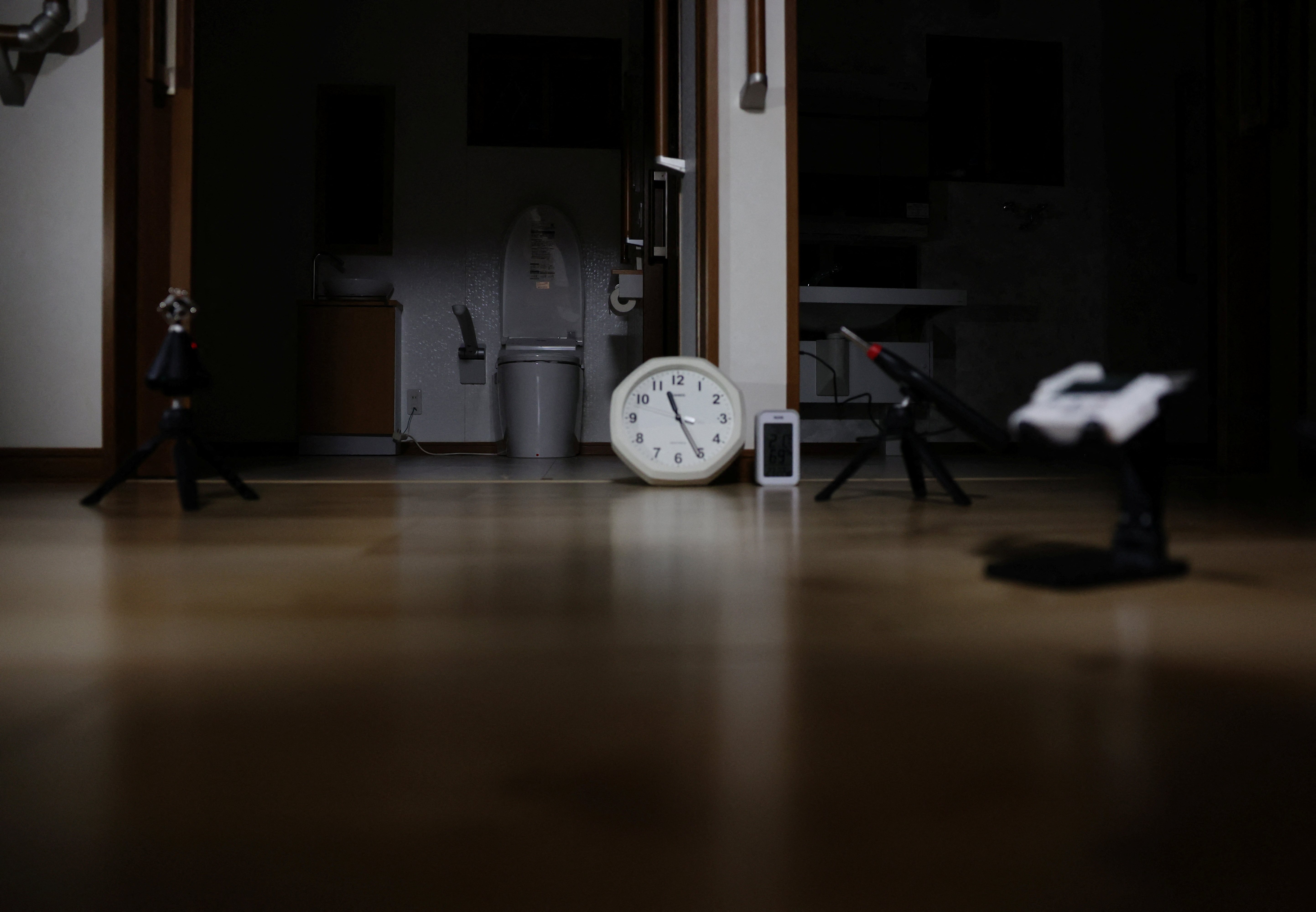 Gadgets are pictured while real estate consultant Kazutoshi Kodama conducts a 'ghost investigation' at a house, in Chiba Prefectur