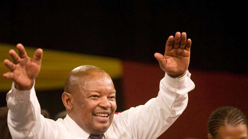 FILE PHOTO: Former South African Defence Minister Mosiuoa Lekota waves to supporters after being elected leader of COPE in Bloemfontein