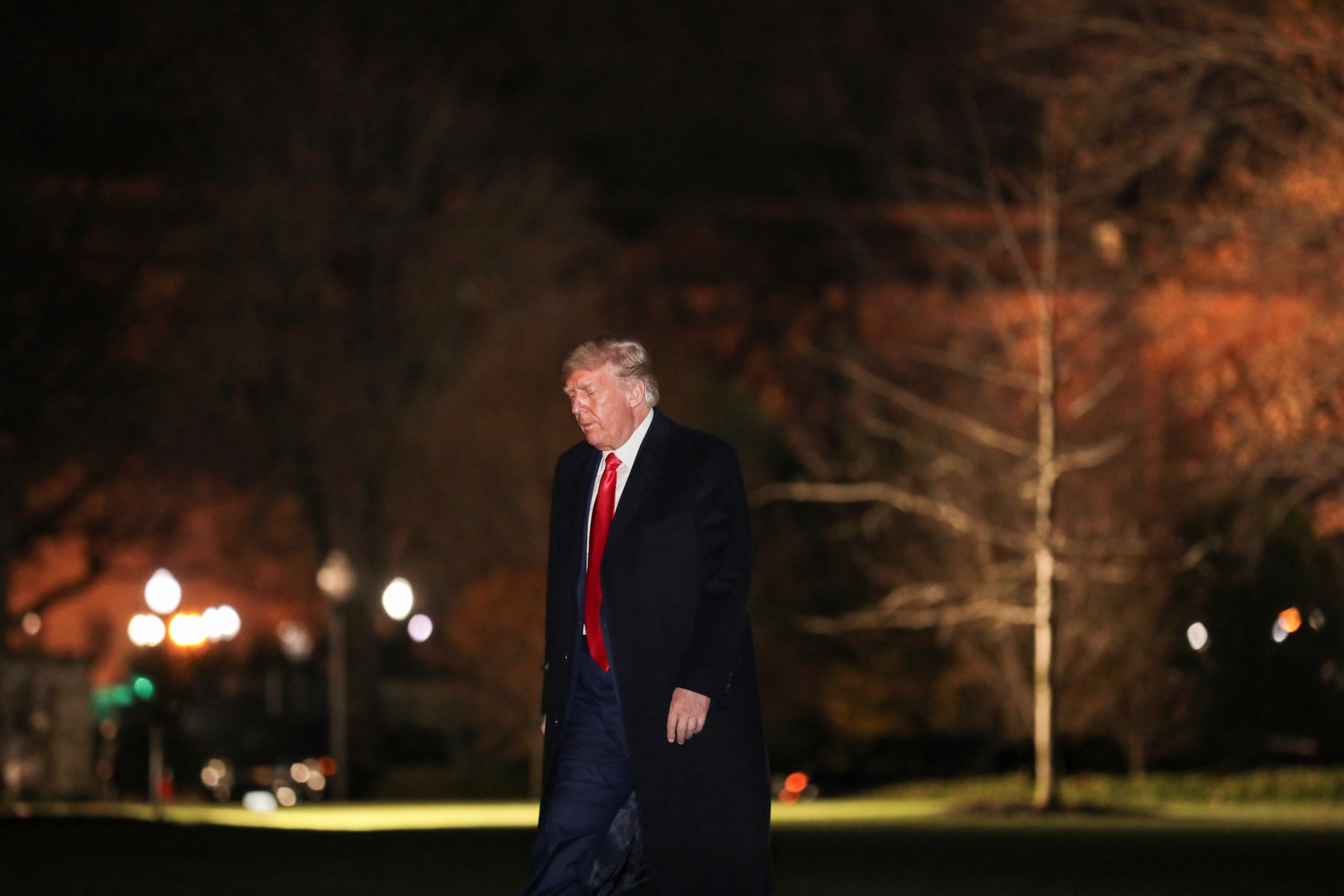 U.S. President Donald Trump arrives from travel to West Point, New York, on the South Lawn at the White House