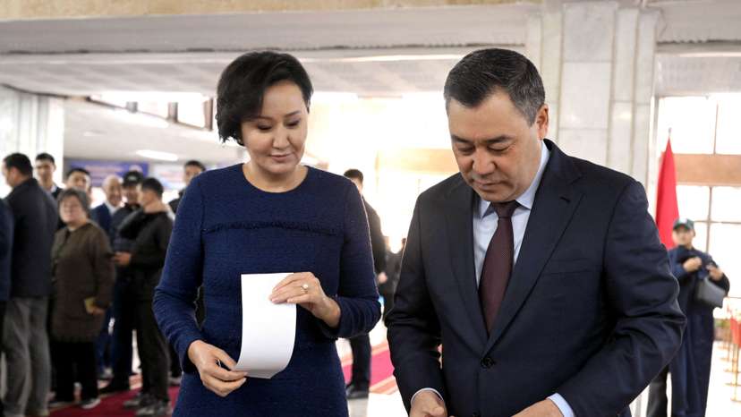 Kyrgyz President Sadyr Japarov visits a polling station during the snap parliamentary election in Bishkek