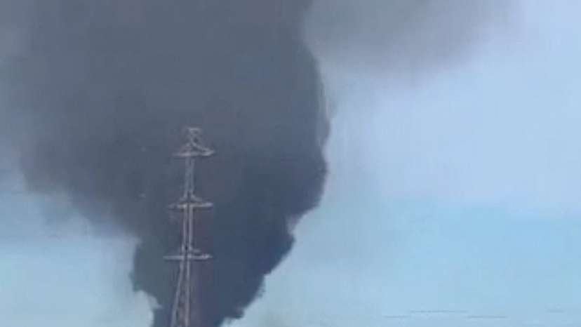 Smoke rises from the international airport that was attacked by insurgents in Bamako