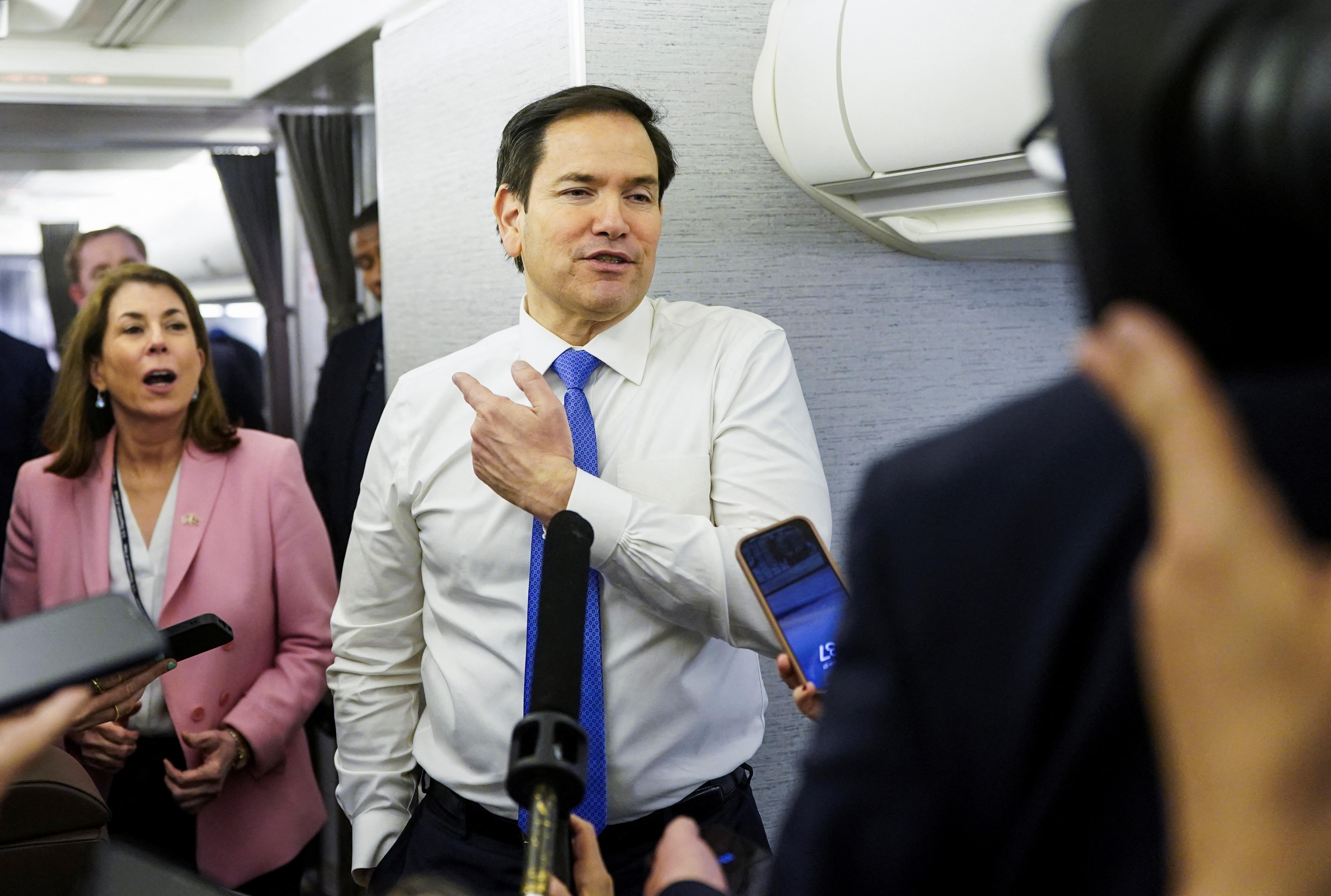 U.S. Secretary of State Rubio speaks with reporters on his plane while flying from Suriname en route to Miami