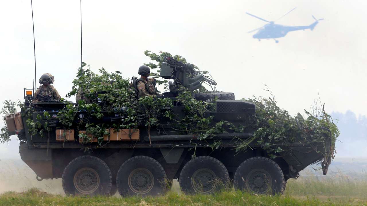 FILE PHOTO: U.S. army soldiers with their Stryker armoured fighting vehicle attend the final day of NATO Saber Strike exercises in Orzysz