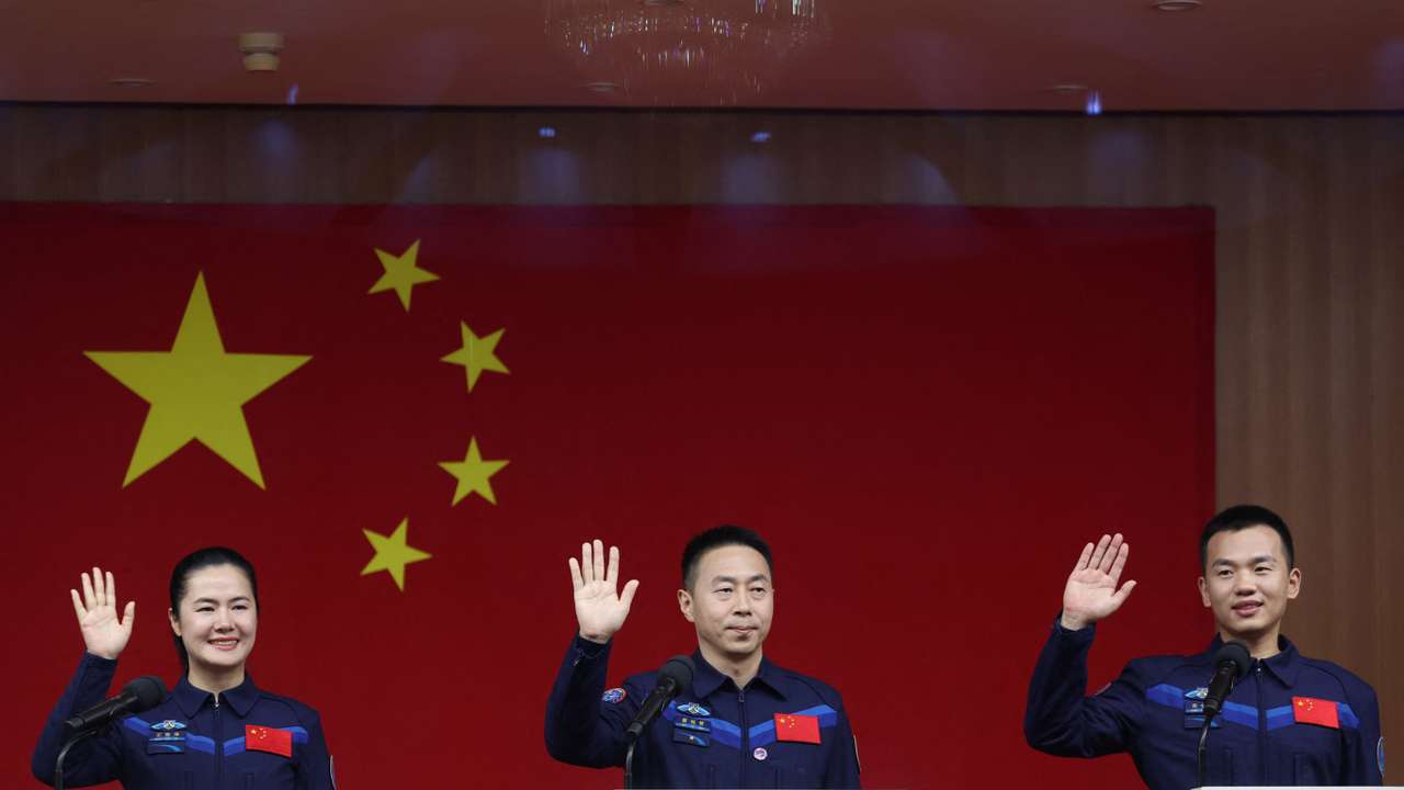 Astronauts Cai Xuzhe, Song Lingdong and Wang Haoze attend a press conference, at Jiuquan Satellite Launch Center