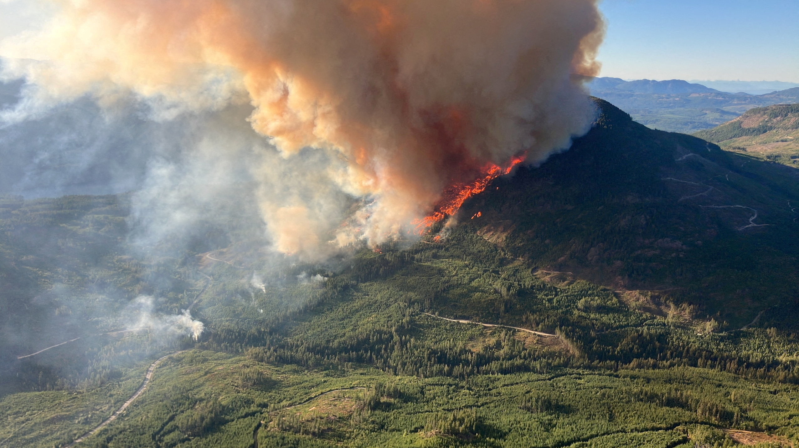 FILE PHOTO: Smoke rises from the Mount Underwood wildfire south of Port Alberni