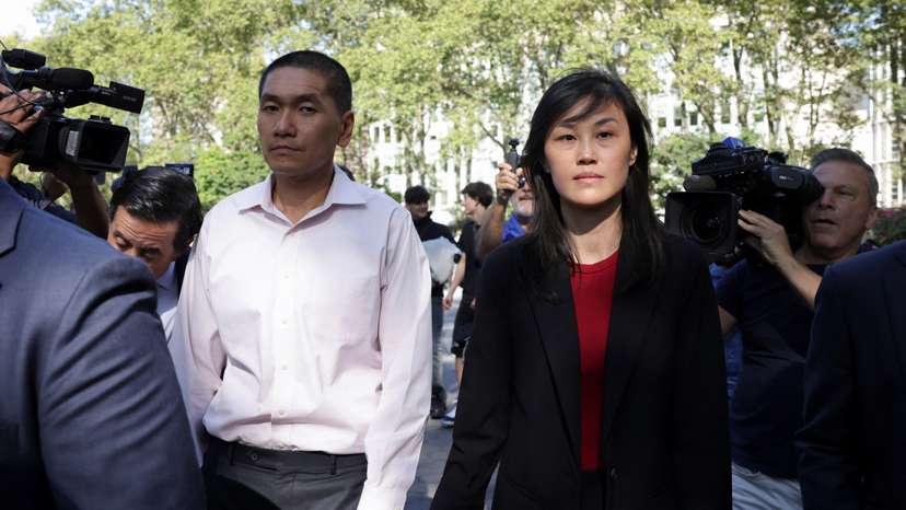 Linda Sun, a former aide to New York State Governor Kathy Hochul, exits Brooklyn Federal court with Chris Hu after Linda was charged with acting as an unregistered agent of China's government, in New York City