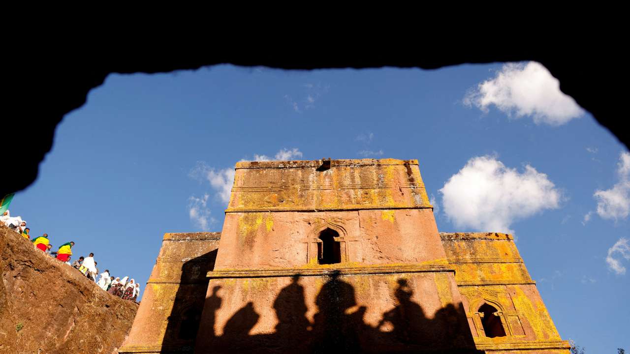 FILE PHOTO: Ethiopian Orthodox pilgrims wait to attend the Ethiopian Christmas Eve celebration at the St.George Rock-Hewn church in Lalibela