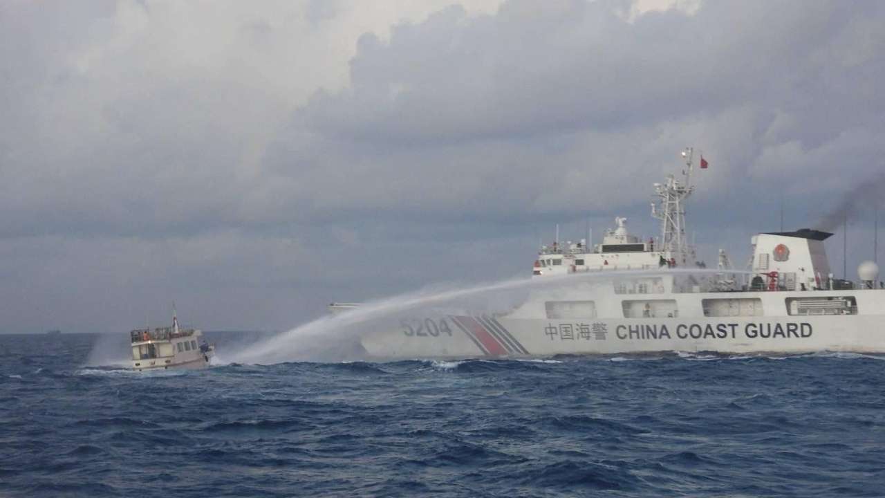 Chinese Coast Guard ship uses water cannon against a Filipino resupply vessel