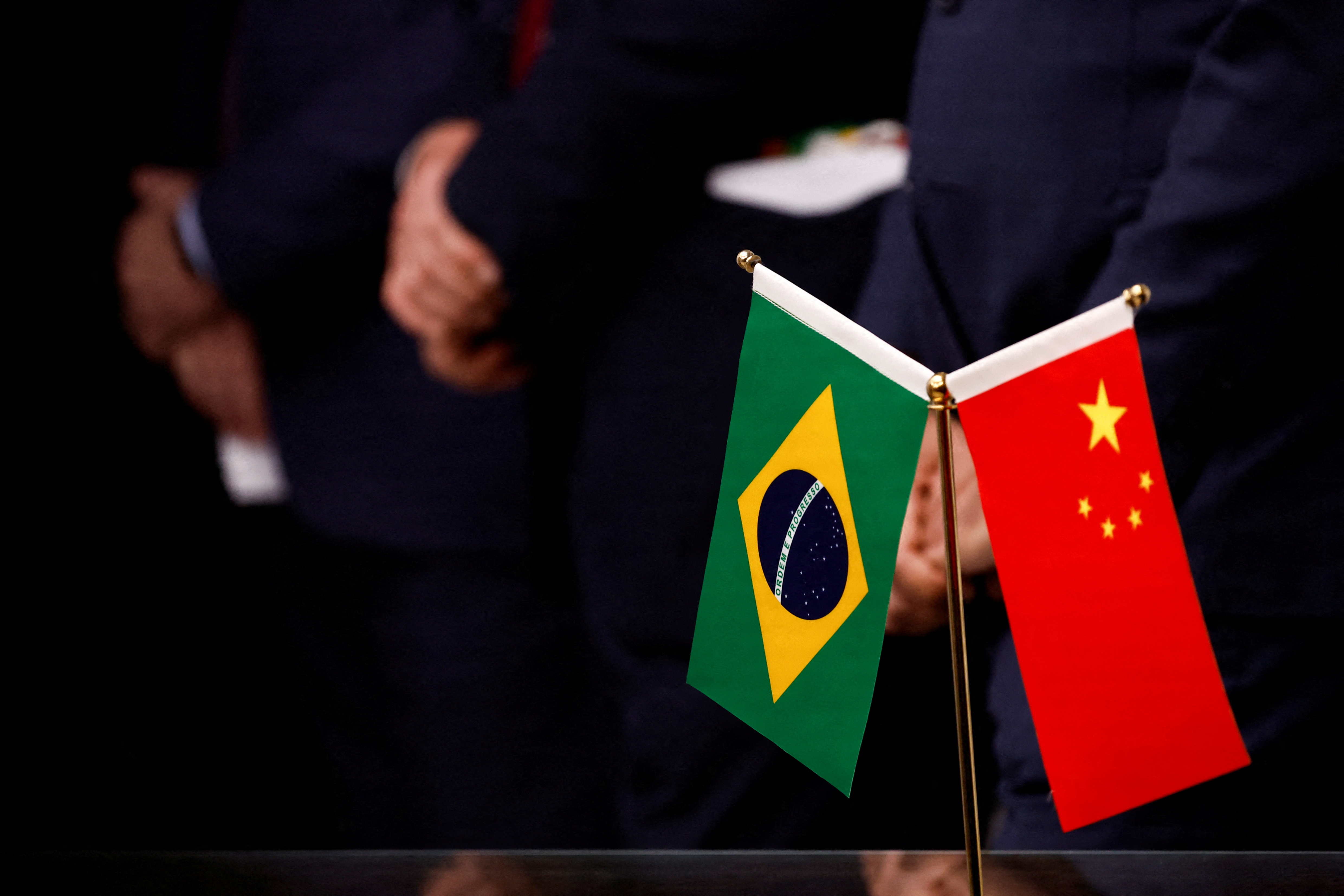 Flags are seen during a news conference at the Brazilian Embassy in Beijing