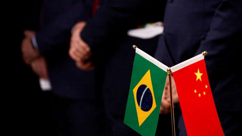 Flags are seen during a news conference at the Brazilian Embassy in Beijing