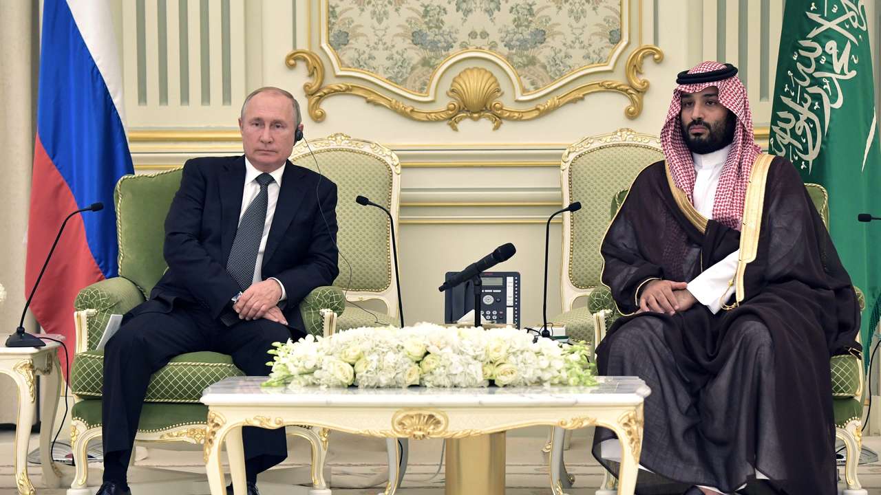 Russian President Vladimir Putin and Saudi Arabia's Crown Prince Mohammed bin Salman attend a meeting in Riyadh