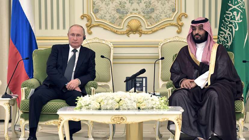 Russian President Vladimir Putin and Saudi Arabia's Crown Prince Mohammed bin Salman attend a meeting in Riyadh