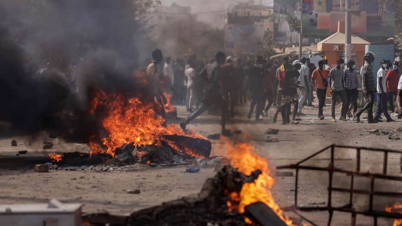 Senegalese demonstrators protest against the postponement of the Feb. 25 presidential election, in Dakar