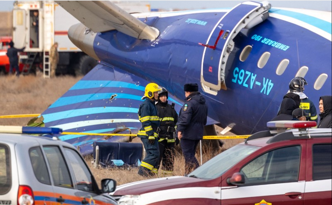Emergency specialists work at the crash site of an Azerbaijan Airlines passenger jet near the western Kazakh city of Aktau on December 25, 2024.