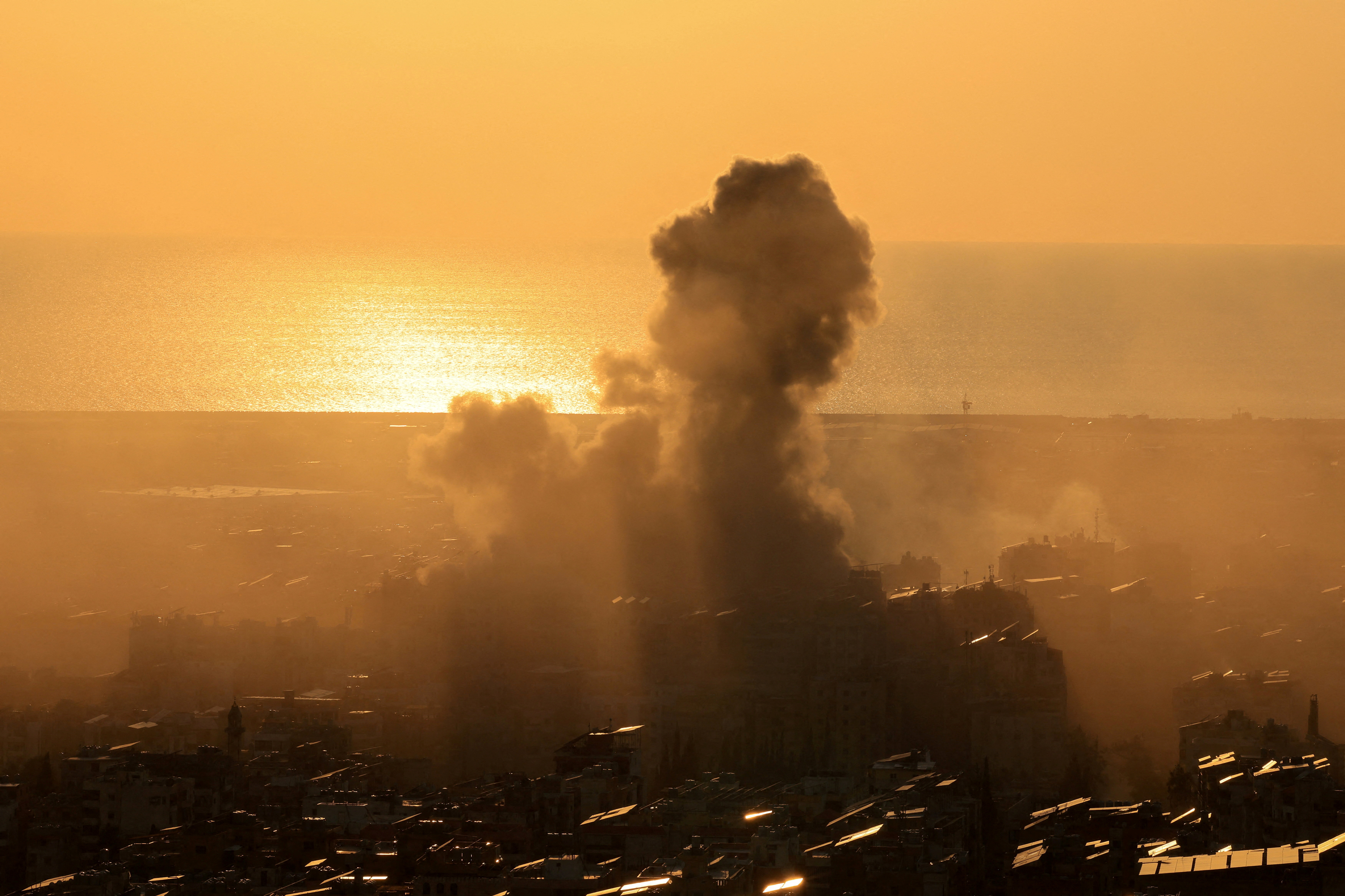FILE PHOTO: Smoke rises after an Israeli strike on Beirut's southern suburbs