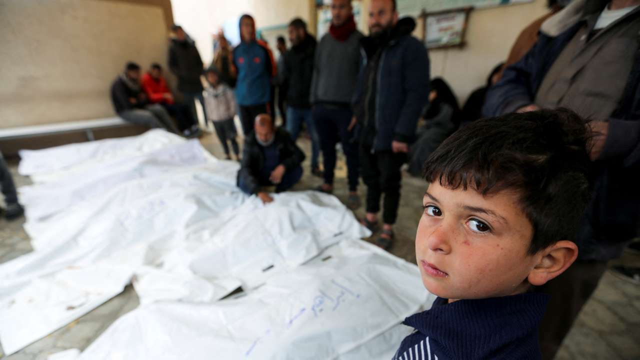 Palestinians mourn loved ones killed in Israeli strikes, in Khan Younis