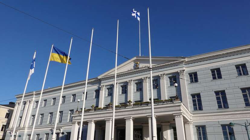 The Finnish and Ukrainian flags flutter outside the city hall, as Finland becomes a member of NATO, in Helsinki