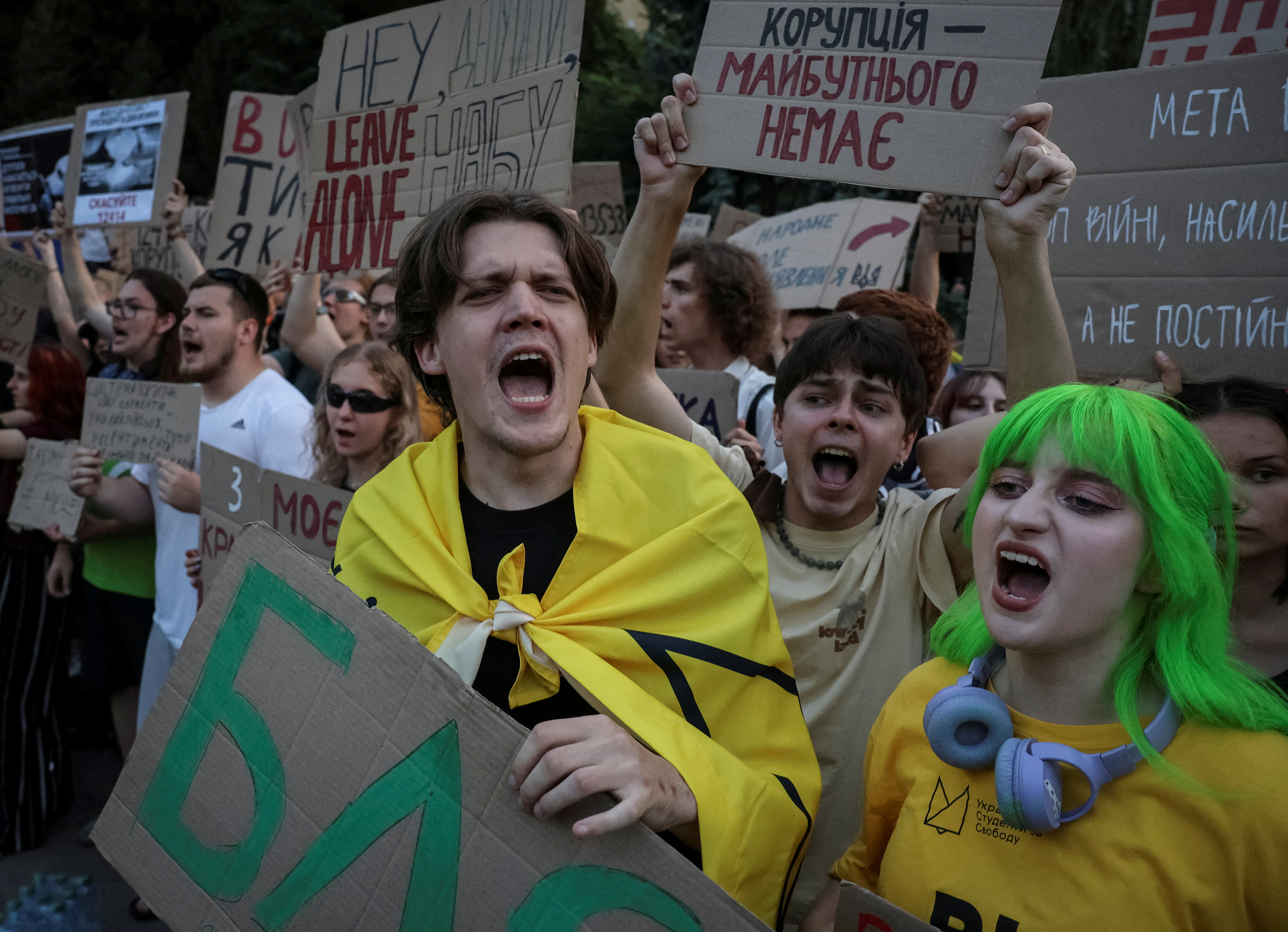 Ukrainians protest against a newly passed law, which curbs independence of anti-corruption institutions in Kyiv
