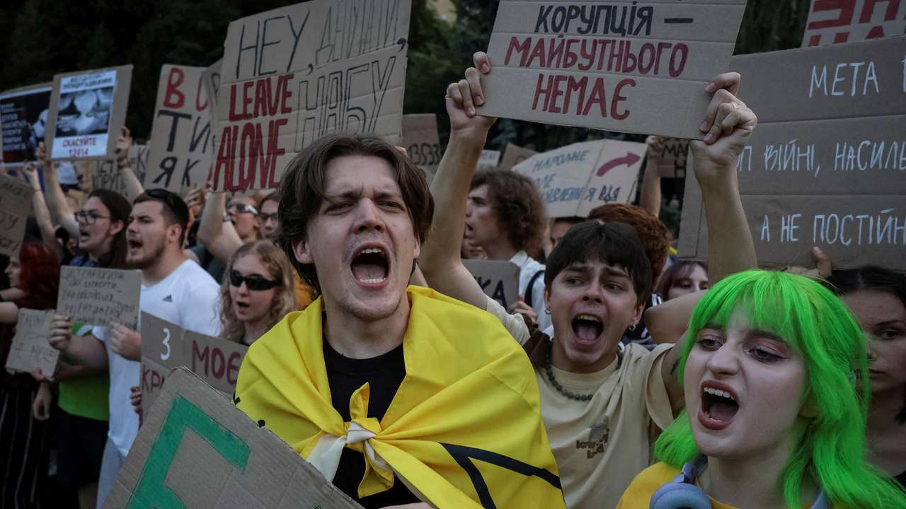 Ukrainians protest against a newly passed law, which curbs independence of anti-corruption institutions in Kyiv