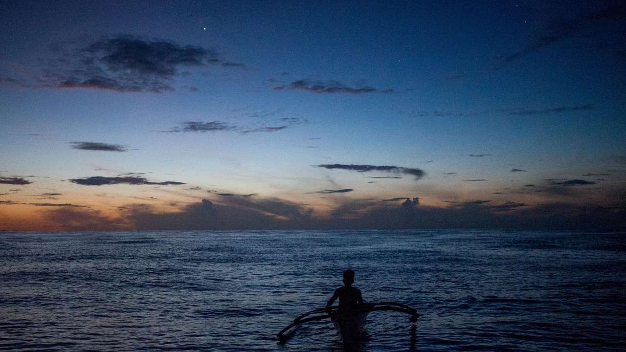 FILE PHOTO: Filipino fishermen in Masinloc, Zambales
